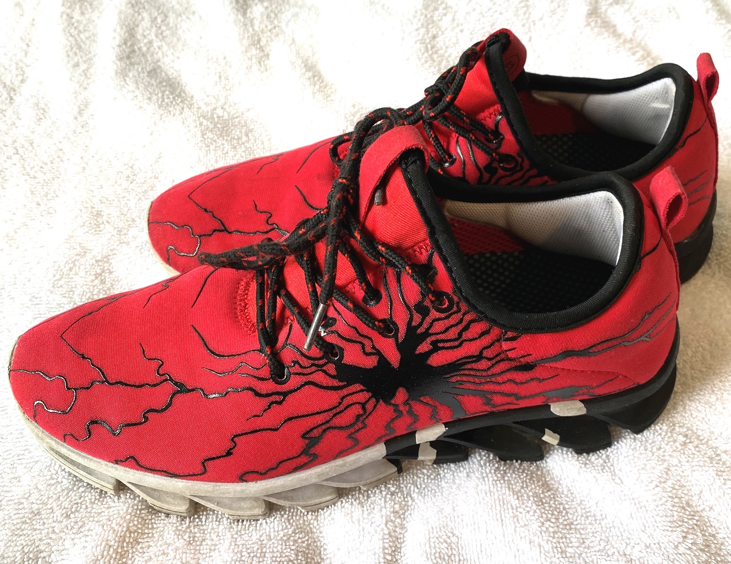 Red and Black Sports Sneakers in The Style of Spiderman