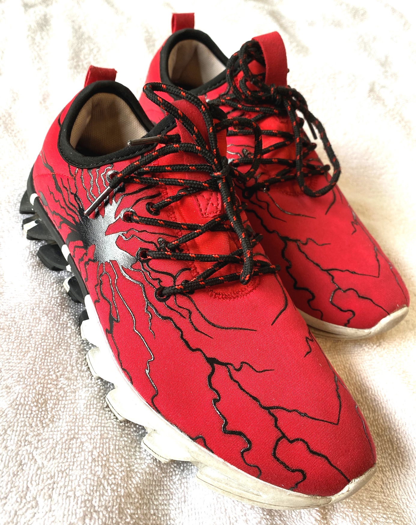 Red and Black Sports Sneakers in The Style of Spiderman