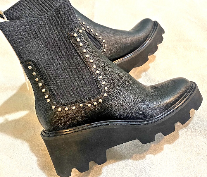 Make a Statement with Women's Thick Sole Black Leather Dolce Vita Boots - Size 10